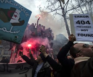epa07411052 Members of the Algerian community in Paris protest against the fifth term of Algerian President Abdelaziz Bouteflika on Place de la Republique in Paris, France, 03 March 2019. The registration process for the upcoming presidential elections in Algeria closed on 03 March, while there was still no official confirmation as to whether the country's ailing president, whose bid for re-election sparked widespread protests, had submitted his candidacy papers. Abdelaziz Bouteflika, serving as the president since 1999, has announced on 19 February he will be running for a fifth term in presidential elections scheduled for 18 April 2019.  EPA/IAN LANGSDON