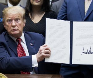 epa07415936 US President Donald J. Trump holds up an executive order he just signed - a 'President's Roadmap to Empower Veterans and End a National Tragedy of Suicide', also known as 'the PREVENTS initiative'; in the Roosevelt Room of the White House in Washington, DC, USA, 05 March 2019. A task force newly-created by the White House aims to coordinate research and veteran suicide prevention efforts across numerous government agencies. An estimated twenty US service members and veterans die by suicide each day.  EPA/MICHAEL REYNOLDS
