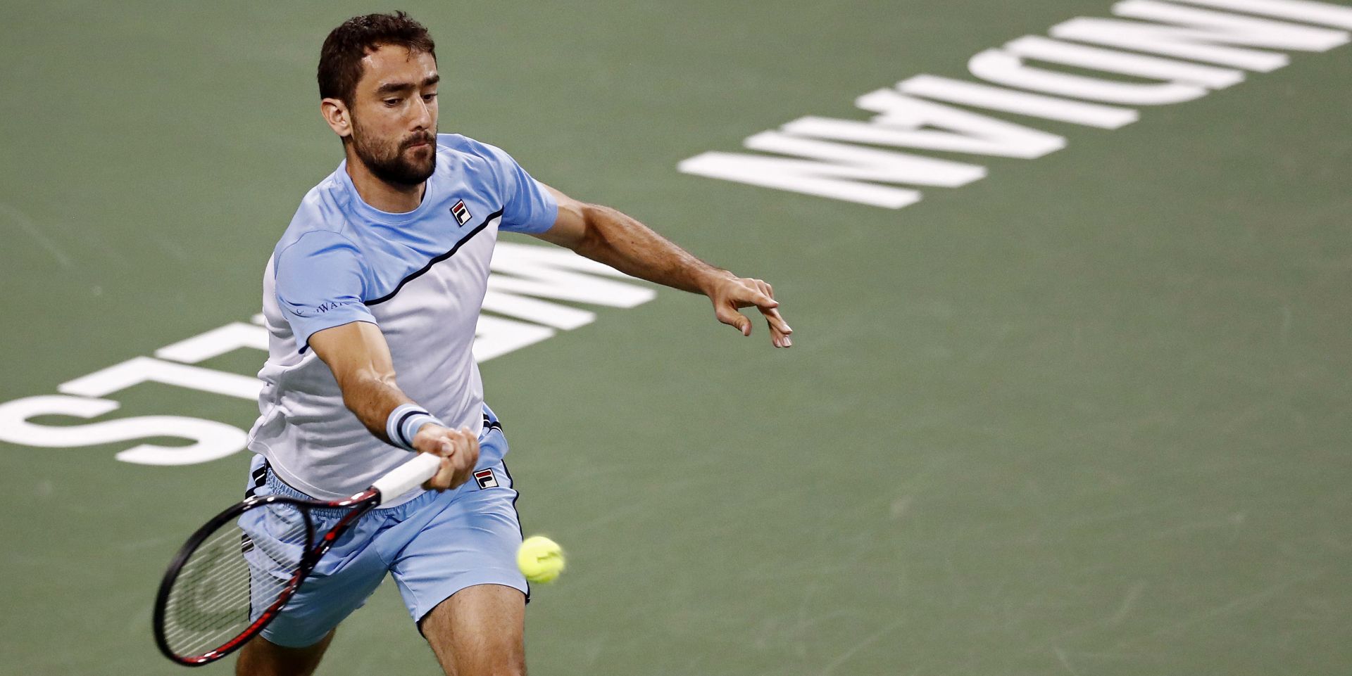 epa07416455 Marin Cilic of Croatia in action against David Goffin of Belgium in the first-ever Eisenhower Cup - a one-night Tie Break Tens event during the BNP Paribas Open tennis tournament at the Indian Wells Tennis Garden in Indian Wells, California, USA, 05 March 2019. The men's and women's final will be played on 17 March 2019.  EPA/LARRY W. SMITH