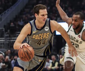 epa07421200 Indiana Pacers forward Bojan Bogdanovic of Croatia (L) drives around Milwaukee Bucks forward Khris Middleton (R) during the NBA game between the Indiana Pacers and the Milwaukee Bucks at Fiserv Forum in Milwaukee, Wisconsin, USA, 07 March 2019.  EPA/TANNEN MAURY  SHUTTERSTOCK OUT