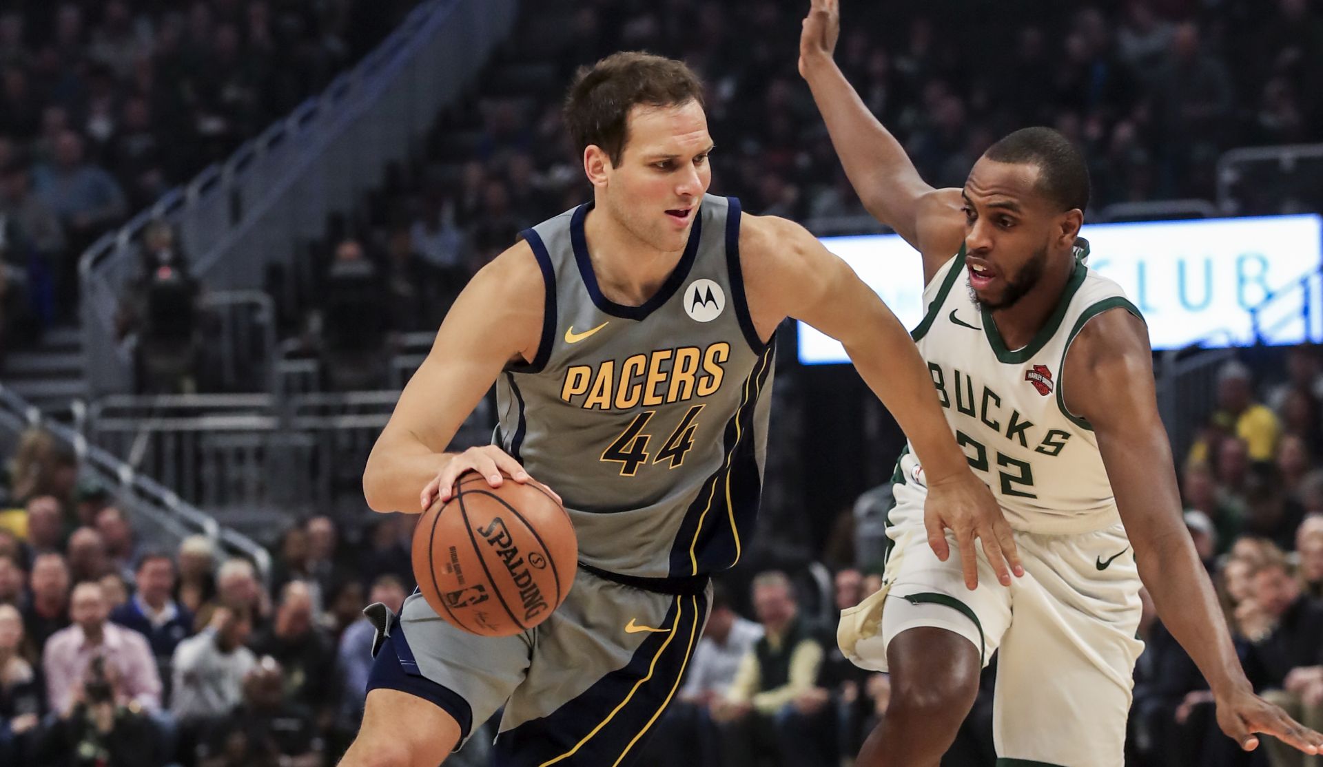 epa07421200 Indiana Pacers forward Bojan Bogdanovic of Croatia (L) drives around Milwaukee Bucks forward Khris Middleton (R) during the NBA game between the Indiana Pacers and the Milwaukee Bucks at Fiserv Forum in Milwaukee, Wisconsin, USA, 07 March 2019.  EPA/TANNEN MAURY  SHUTTERSTOCK OUT