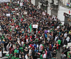 epa07422708 Algerian protesters during a protest against the fifth term of Abdelaziz Bouteflika in Algiers, Algeria, 08 March 2019. Algerian authorities on 01 March braced for what are expected to be the largest protests in the Algerian capital in over a decade. Several protests and rallies were held in Algeria since Bouteflika serving as the president since 1999, announced he will be running for a fifth term in presidential elections scheduled for 18 April 2019.  EPA/MOHAMED MESSARA