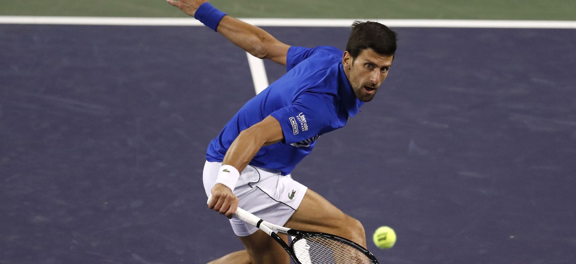 epa07426207 Novak Djokovic of Serbia in action against Bjorn Fratangelo of the US during the BNP Paribas Open tennis tournament at the Indian Wells Tennis Garden in Indian Wells, California, USA, 09 March 2019. The men's and women's final will be played on 17 March 2019.  EPA/JOHN G. MABANGLO