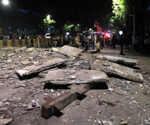 epa07436806 A general view of the partly collapsed foot over bridge adjacent to Chhtrapati Shivaji Maharaj Terminus railway station, in Mumbai, India, 14 March 2019. According to initial reports, three people were killed and more than 30 others injured in the incident.  EPA/DIVYAKANT SOLANKI