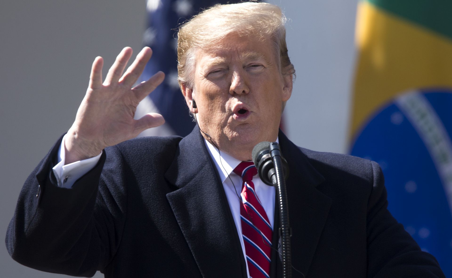 epa07449002 US President Donald J. Trump speaks during a joint news conference with Brazilian President Jair Bolsonaro (unseen) in the Rose Garden of the White House in Washington, DC, USA, 19 March 2019. Bolsonaro, a right-wing nationalist who earned the nickname the 'Trump of the Tropics,' met with President Trump for bilateral negotiations and a joint press conference.  EPA/MICHAEL REYNOLDS