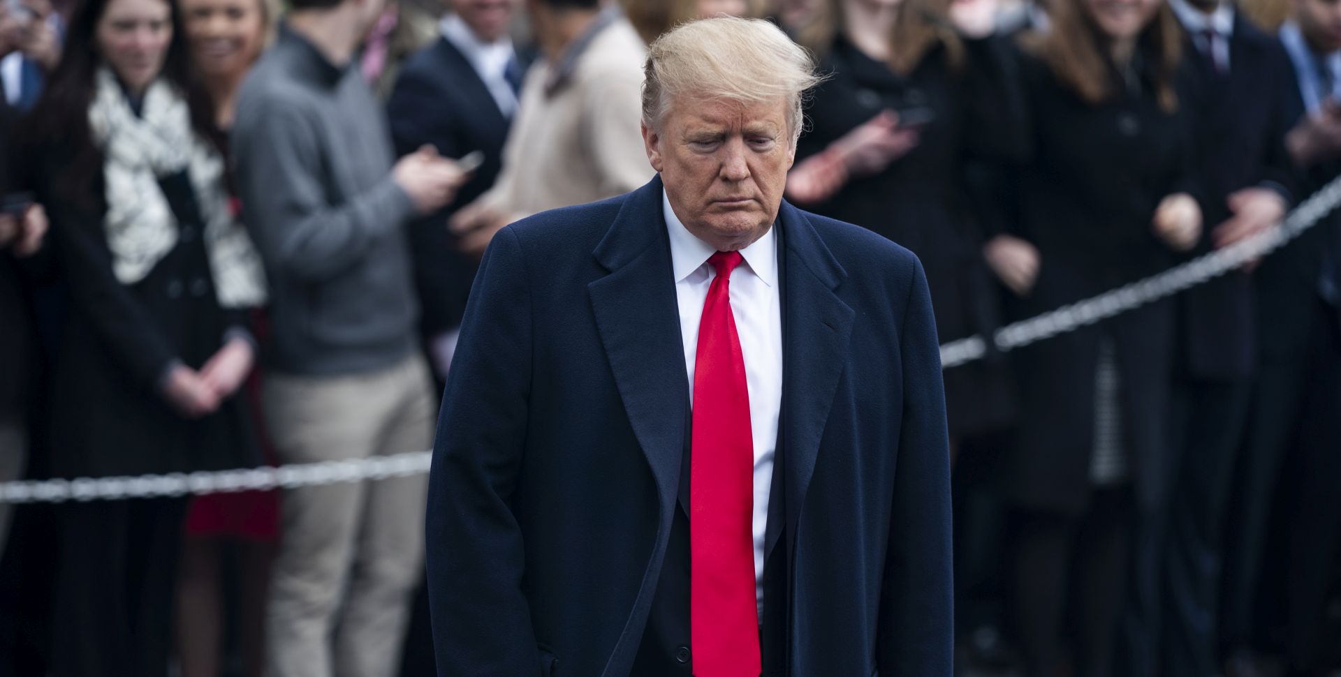 epa07455963 US President Donald J. Trump prepares to speak to the media as he departs the White House for his Mar-a-Lago resort in Washington, DC, USA, 22 March 2019. The Trump administration, along with lawmakers, are awaiting the release of special counsel Robert Mueller's report into President Trump's behavior.  EPA/JIM LO SCALZO