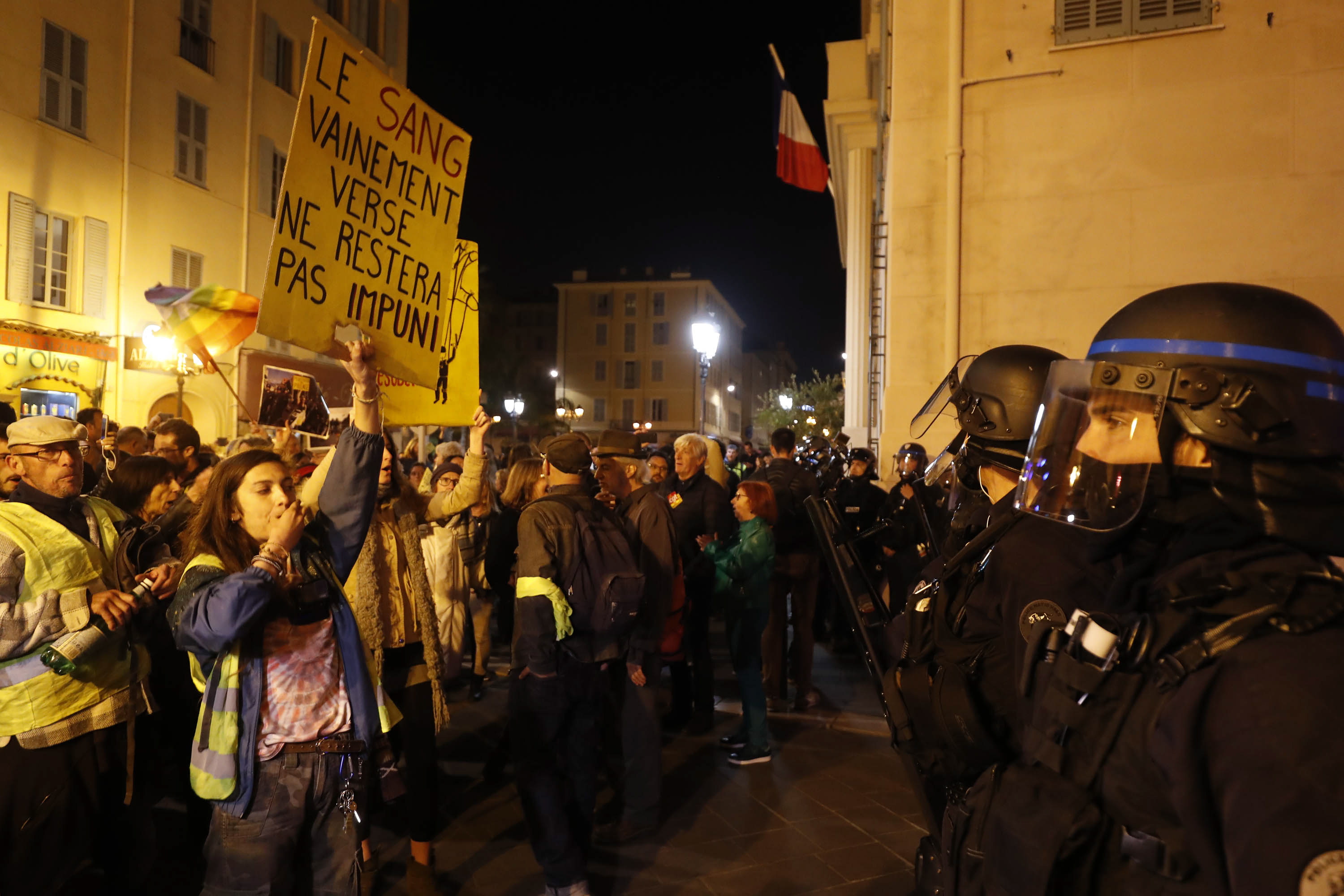 epa07463270 Yellow vest attend a protest in Nice, France, 25 March 2019 in support of an elderly woman injured during a demonstration by anti-government 'Yellow Vests' (Gilets jaunes) movement in Nice, on 23 March. 
The banner reads 'the blood that is vainly shed will not go unpunished '.  EPA/SEBASTIEN NOGIER