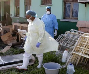 epa07469453 Mozambican doctors and nurses cleane and prepare beds in the newly opened Unicef center of Cholera treatment in the Macurungo neighbourhood of the city of Beira, after the passage of cyclone Idai, in the province of Sofala, central Mozambique, 28 March 2019. Reports state that some 1.7 million people are said to be affected across southern Africa.  EPA/TIAGO PETINGA