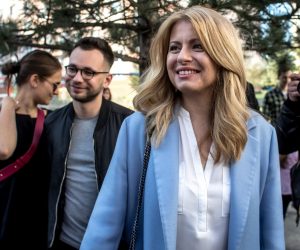 epa07473243 Slovak presidential candidate Zuzana Caputova leaves a polling station during Slovakia's presidential election run-off in Pezinok, Slovakia, 30 March 2019. The second round of presidential elections in Slovakia will be contended by environmental lawyer Zuzana Caputova with her opponent, European Commission Vice-President Sefcovic.  EPA/JAKUB GAVLAK