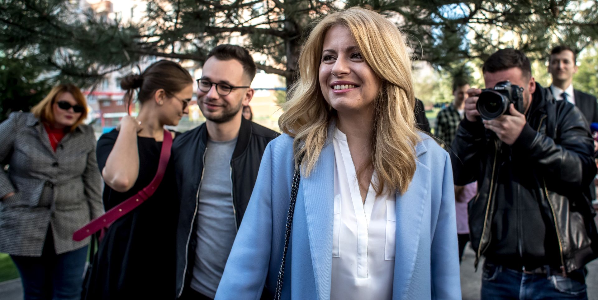 epa07473243 Slovak presidential candidate Zuzana Caputova leaves a polling station during Slovakia's presidential election run-off in Pezinok, Slovakia, 30 March 2019. The second round of presidential elections in Slovakia will be contended by environmental lawyer Zuzana Caputova with her opponent, European Commission Vice-President Sefcovic.  EPA/JAKUB GAVLAK
