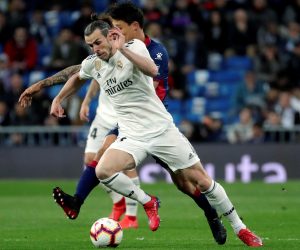 epa07477293 Real Madrid's winger Gareth Bale controls the ball during the Spanish LaLiga match between Real Madrid and SD Huesca at Santiago Bernabeu stadium in Madrid, Spain, 31 March 2019.  EPA/JuanJo Martin