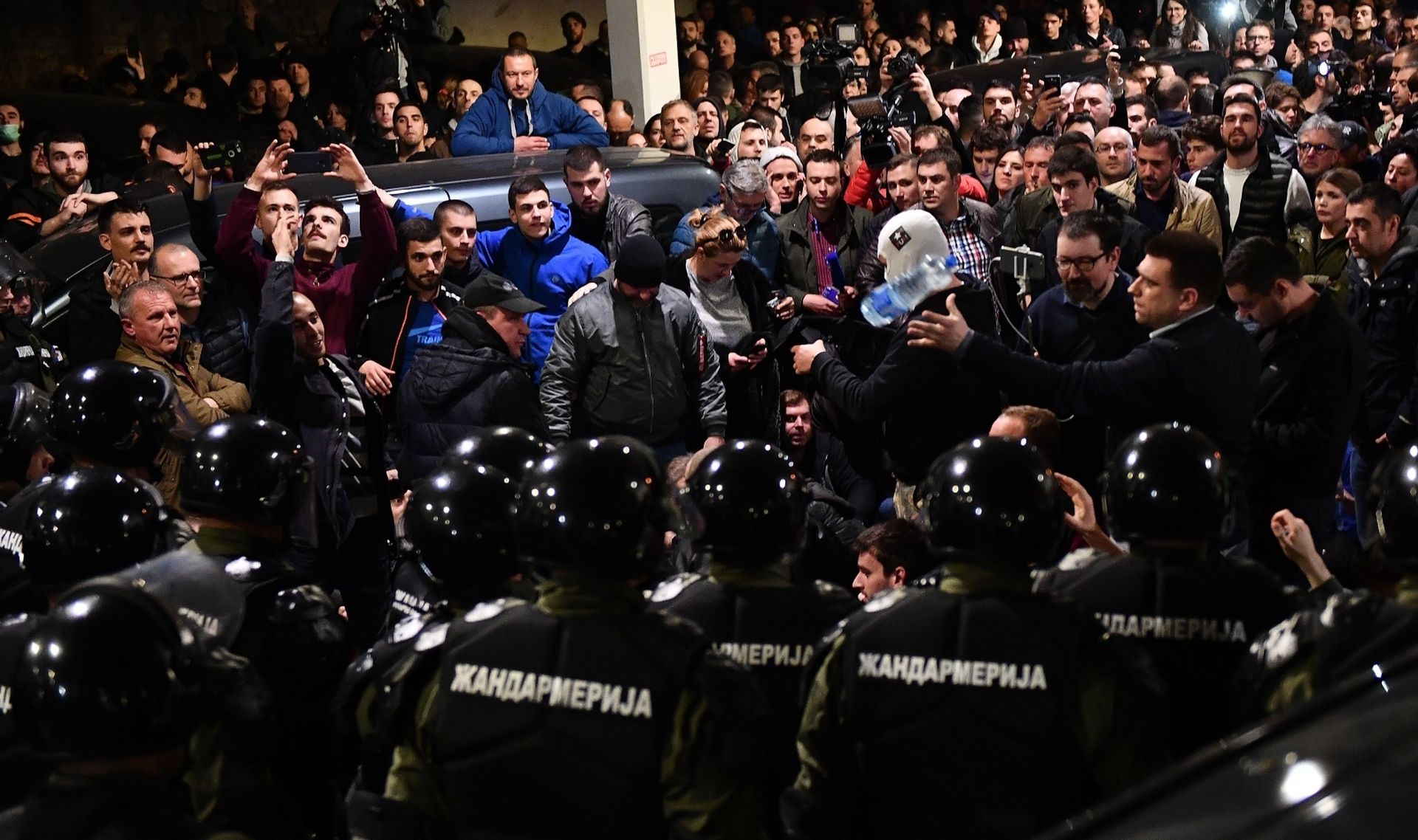 16.03.2019.,Beograd, Srbija - U Beogradu se odrzava 15. po redu prosvjed "Jedan od pet milijuna". Protestanti su blokirali ulaz u zgradu RTS, a jedan broj prosvjednika usao je u zgradu. Policija i Zandarmerija izbacila je ucesnike protesta iz zgrade RTS, u koju su, predvodjeni liderom Dveri Boskom Obradovicem usli. Photo: Srdjan Ilic/PIXSELL