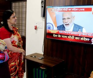 epa07466328 Indian people listen to Indian Prime Minister Narendra Modi's televised address to the nation, in Bhopal, India, 27 March 2019. In a rare address to the nation, Modi announced that Indian scientists conducted Mission Shakti, an anti-satellite missile test that shot down a live satellite at a low-earth orbit. India has entered its name as an elite space power after Indian Space Research Organisation (ISRO) scientists, using an indigenously built anti-satellite missile, successfully shot down a satellite operating in lower orbit.  EPA/SANJEEV GUPTA