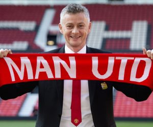 epa07469147 Ole Gunnar Solskjaer holds a scarf pitch side inside Old Trafford after being announced as the new manager of Manchester United  at Old Trafford, Manchester, Britain, 28 March 2019.  EPA/PETER POWELL EDITORIAL USE ONLY. No use with unauthorized audio, video, data, fixture lists, club/league logos or 'live' services. Online in-match use limited to 120 images, no video emulation. No use in betting, games or single club/league/player publications