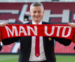 epa07469147 Ole Gunnar Solskjaer holds a scarf pitch side inside Old Trafford after being announced as the new manager of Manchester United  at Old Trafford, Manchester, Britain, 28 March 2019.  EPA/PETER POWELL EDITORIAL USE ONLY. No use with unauthorized audio, video, data, fixture lists, club/league logos or 'live' services. Online in-match use limited to 120 images, no video emulation. No use in betting, games or single club/league/player publications