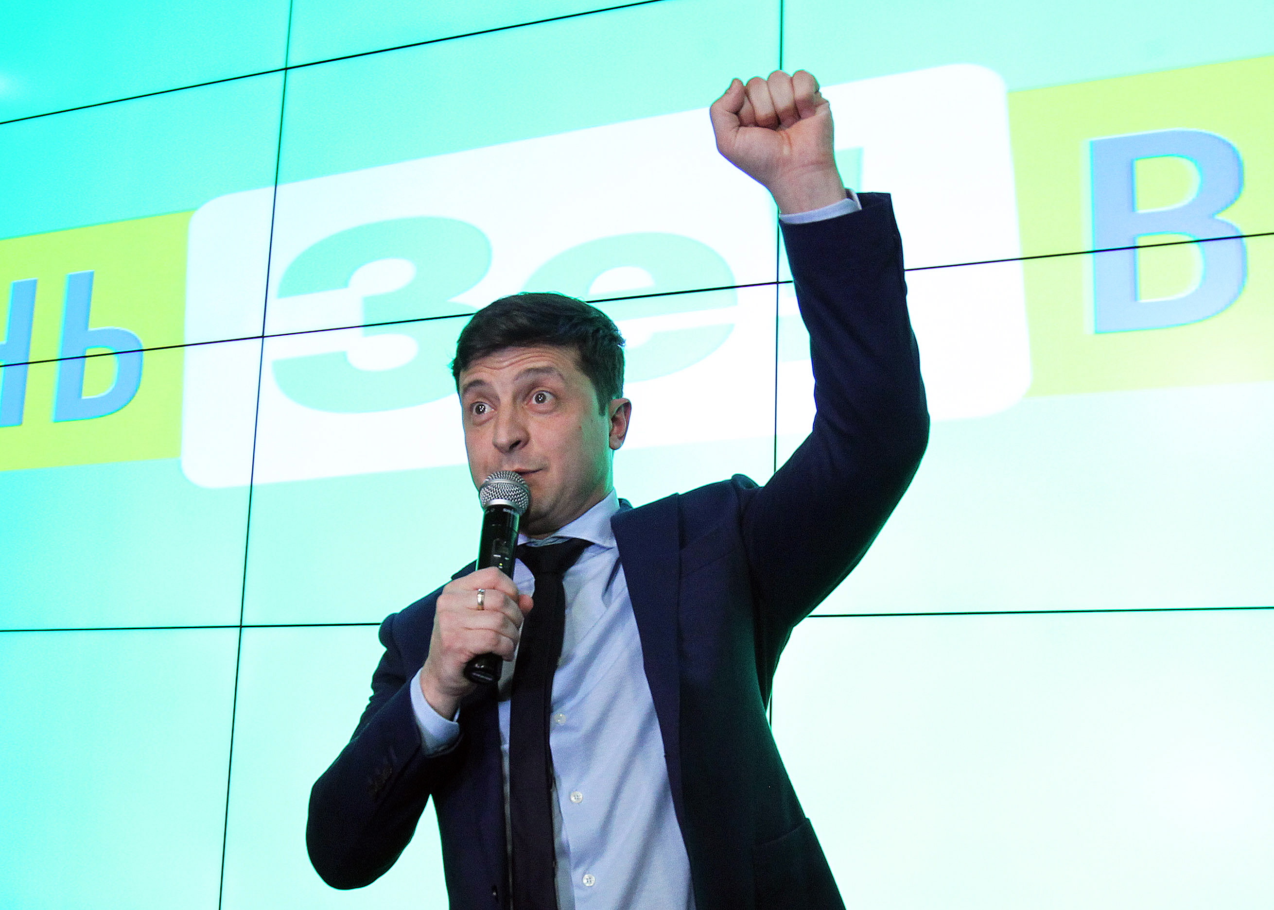 epa07477157 Ukrainian showman and comedian, and Presidential candidate Volodymyr Zelenskiy speaks at his headquarters following a presidential elections in Kiev, Ukraine, 31 March 2019. According to initial exit polls, Volodymyr Zelensky won the first round of the Ukraine presidential election with 30.4 percent of votes. Ukrainian President Petro Poroshenko is second with 17.8 percent of votes. If no candidate will receive more than half of the votes, the run-off elections will be held on 21 April 2019.  EPA/STEPAN FRANKO