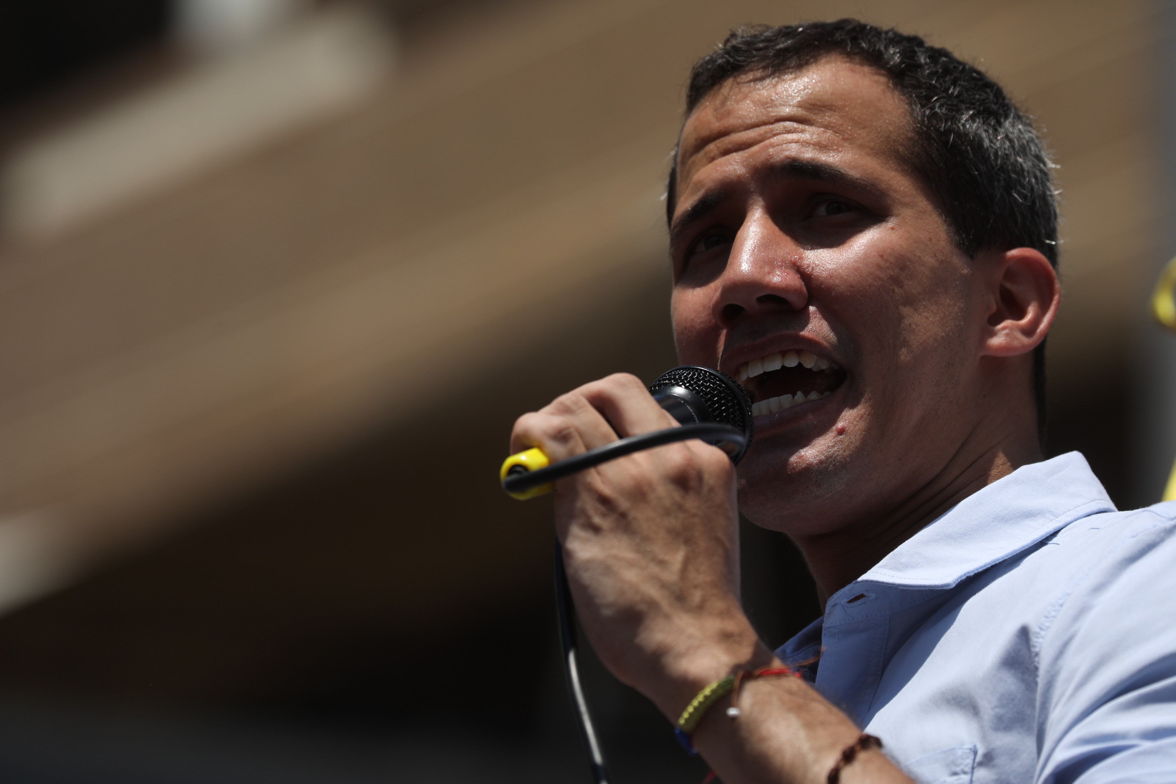 epa07489409 The head of the Venezuelan Parliament Juan Guaido speaks during an event with thousand of supporters in the streets of Caracas, Venezuela, on 06 April 2019.  EPA/Miguel Gutiérrez
