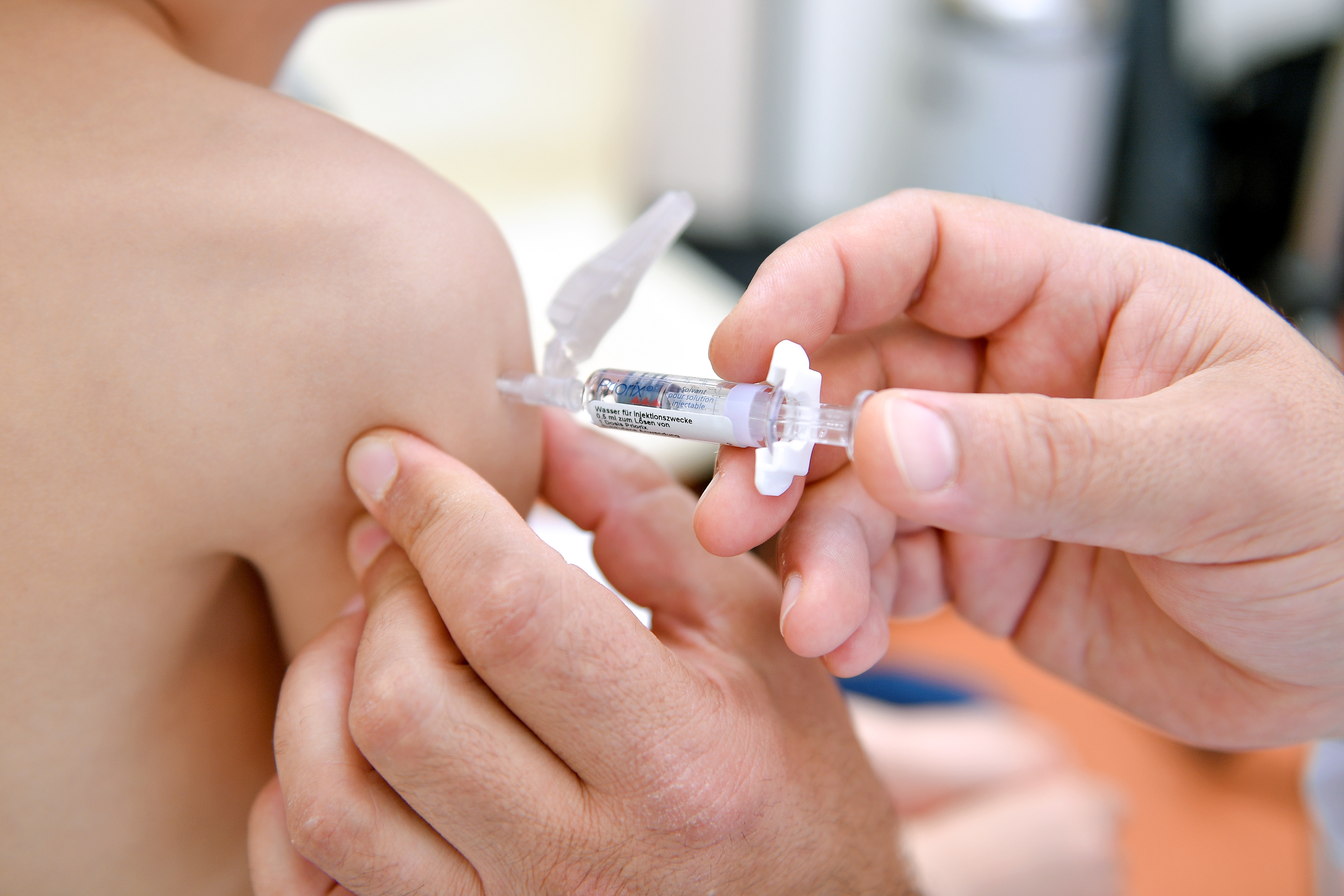 epa07512145 A pediatrician shows a measles vaccine in a hospital in Schwelm, Germany, 17 April 2019. With 112,000 cases worldwide in the first three months of this year, the number of measles cases has increased fourfold compared to the previous year. In Europe, the number of cases of measles in 2018 was the highest in ten years. The highly dangerous viral disease is spreading more and more. The federal state of Brandenburg is the first German region to introduce compulsory vaccination for children, as concerns about the increase in measles infections are growing. All children attending kindergartens in the state will be required to be vaccinated against measles as part of new measures.  EPA/SASCHA STEINBACH