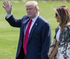 epa07514881 US President Donald J. Trump (L) and First Lady Melania Trump (R) walk on the South Lawn of the White House to Marine One in Washington, DC, USA, 18 April 2019. Trump was leaving to spend the long Easter Weekend at his Mar-a-Lago Club in Palm Beach, Florida. Trump did not stop to speak with the media, after a redacted version of Special Counsel Robert Mueller's report on Russian interference in the 2016 election was released earlier in the day.  EPA/ERIK S. LESSER