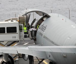 epa07517091 A person injured in the 17 April bus crash is boarded onto a German air force airplane to to be flown to Germany, from the airport oif Funchal, Madeira island, Portugal, 20 April 2019. At least 29 German tourists were killed after a bus crashed at the site on Madeira island on 17 April 2019.  EPA/HOMEM GOUVEIA