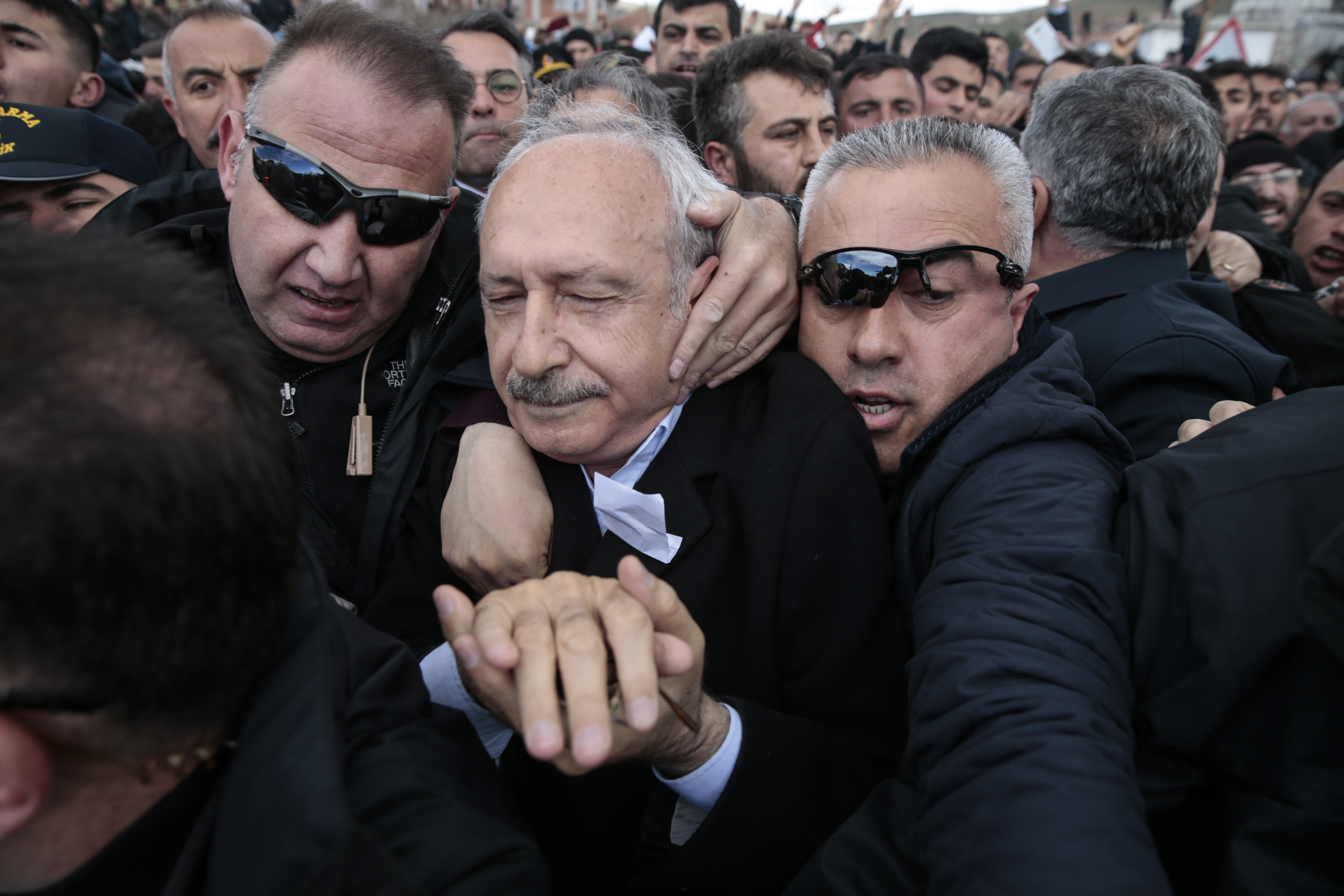 epa07519993 Turkey's main opposition Republican People's Party (CHP) leader Kemal Kilicdaroglu (C) is accompanied by police officers and guards as he was attacked by a nationalist group during the funeral of a Turkish soldier who died in an armed attack by Kurdistan Workers' Party (PKK) militants in Iraqi border of Turkey, in Cubuk district, near Ankara, Turkey 21 April 2019. Four Turkish soldiers who were killed on April 19 during military operations in the Turkey-Iraq border area.
TURKEY OUT, USA OUT, UK OUT, CANADA OUT, FRANCE OUT, SWEDEN OUT, IRAQ OUT, JORDAN OUT, KUWAIT OUT, LEBANON OUT, OMAN OUT, QATAR OUT, SAUDI ARABIA OUT, SYRIA OUT, UAE OUT, YEMEN OUT, BAHRAIN OUT, EGYPT OUT, LIBYA OUT, ALGERIA OUT, MOROCCO OUT, TUNISIA OUT, AZERBAIJAN OUT, ALBANIA OUT, BOSNIA HERZEGOVINA OUT, BULGARIA OUT, KOSOVO OUT, CROATIA OUT, MACEDONIA OUT, MONTENEGRO OUT, SERBIA OUT  EPA/METIN AKTAS/ANADOLU AGENCY  SHUTTERSTOCK OUT