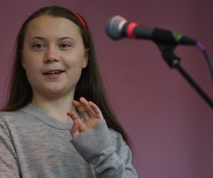 epa07520538 Swedish schoolgirl climate activist Greta Thunberg speaks during an Extinction Rebellion protest in Marble Arch, central London, Britain, 21 April 2019. The Extinction Rebellion are holding a number of protests across London to draw attention to climate change.  EPA/NEIL HALL