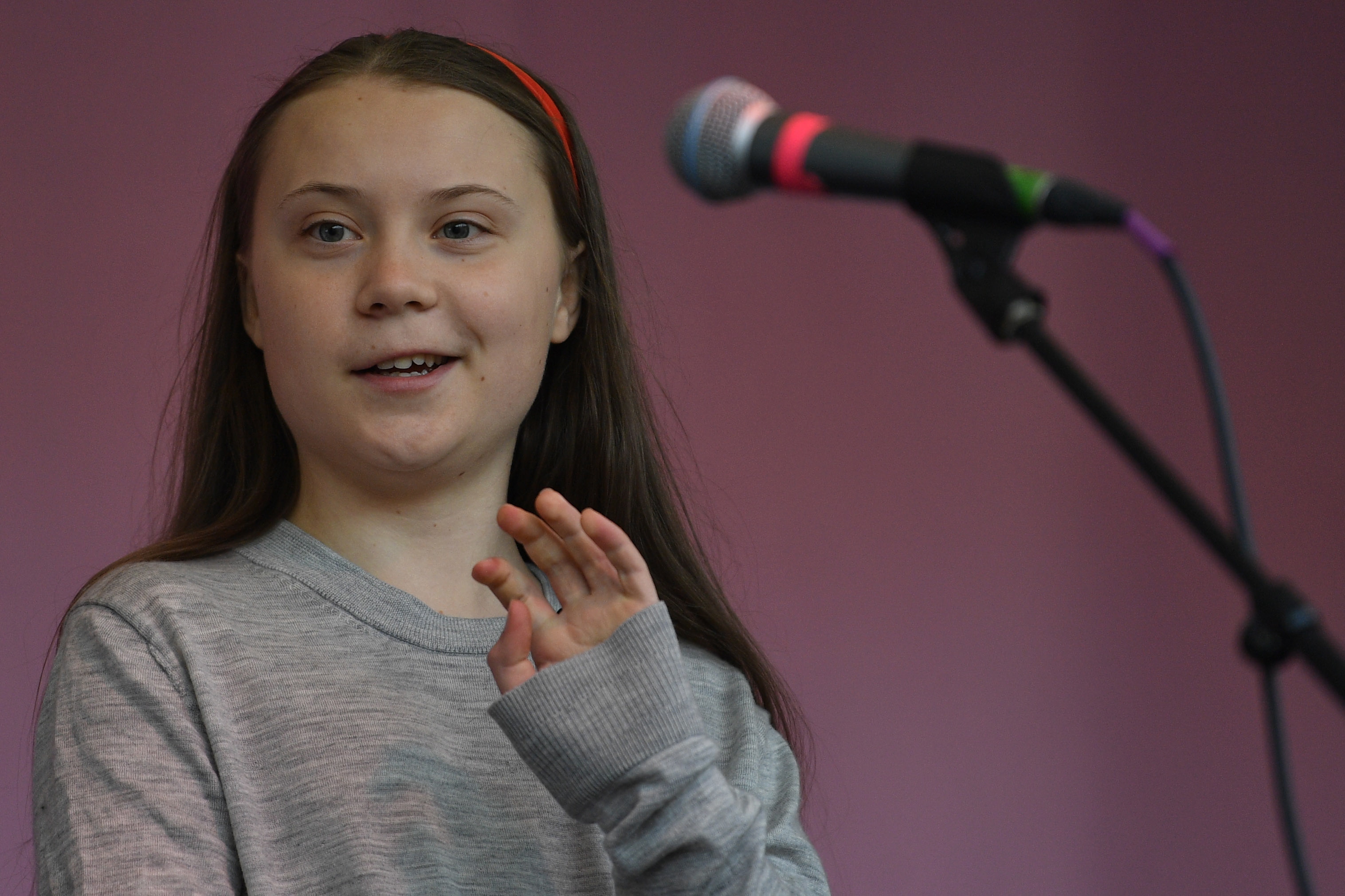 epa07520538 Swedish schoolgirl climate activist Greta Thunberg speaks during an Extinction Rebellion protest in Marble Arch, central London, Britain, 21 April 2019. The Extinction Rebellion are holding a number of protests across London to draw attention to climate change.  EPA/NEIL HALL
