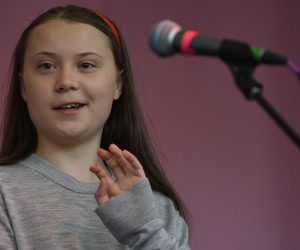 epa07520538 Swedish schoolgirl climate activist Greta Thunberg speaks during an Extinction Rebellion protest in Marble Arch, central London, Britain, 21 April 2019. The Extinction Rebellion are holding a number of protests across London to draw attention to climate change.  EPA/NEIL HALL