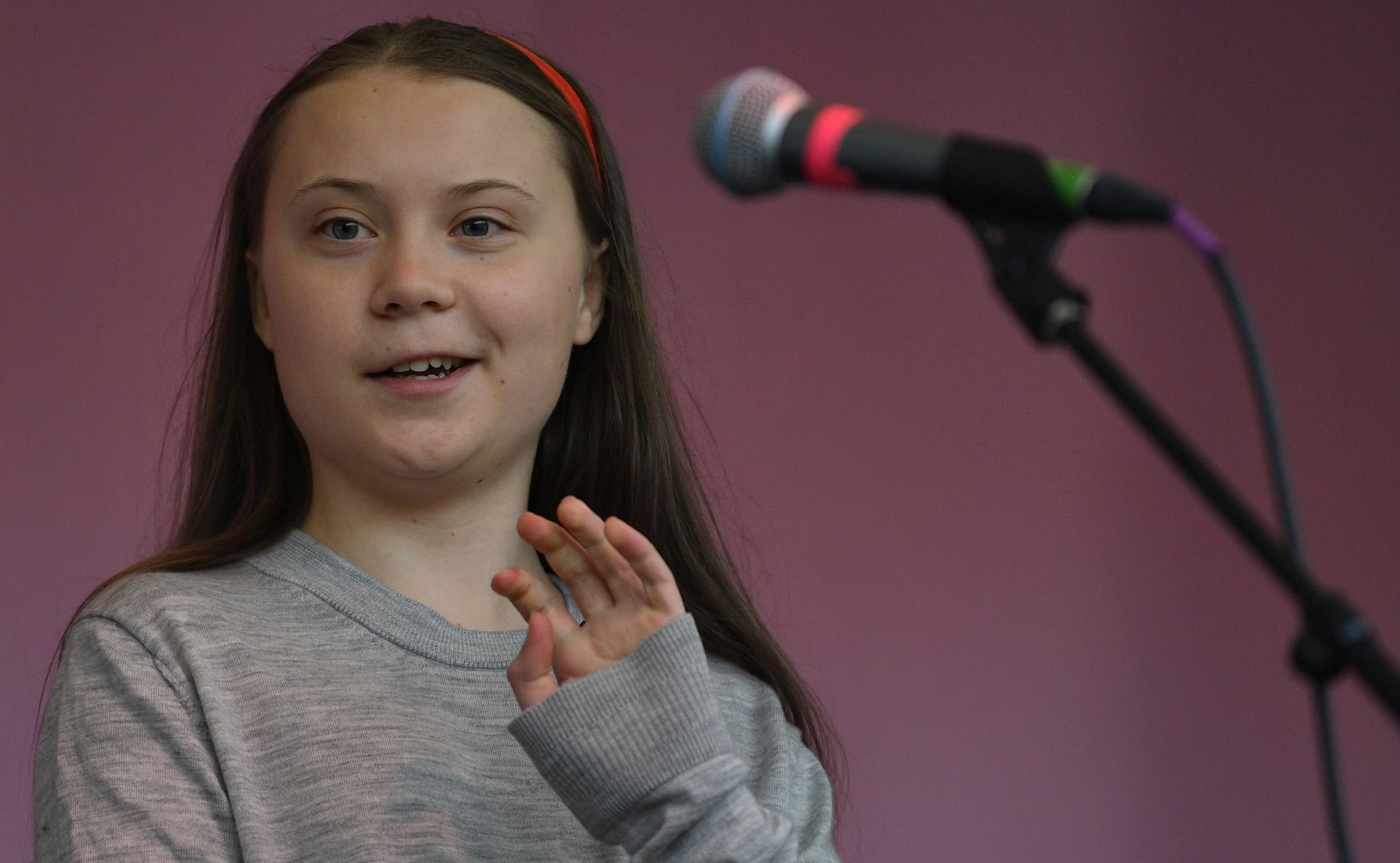 epa07520538 Swedish schoolgirl climate activist Greta Thunberg speaks during an Extinction Rebellion protest in Marble Arch, central London, Britain, 21 April 2019. The Extinction Rebellion are holding a number of protests across London to draw attention to climate change.  EPA/NEIL HALL