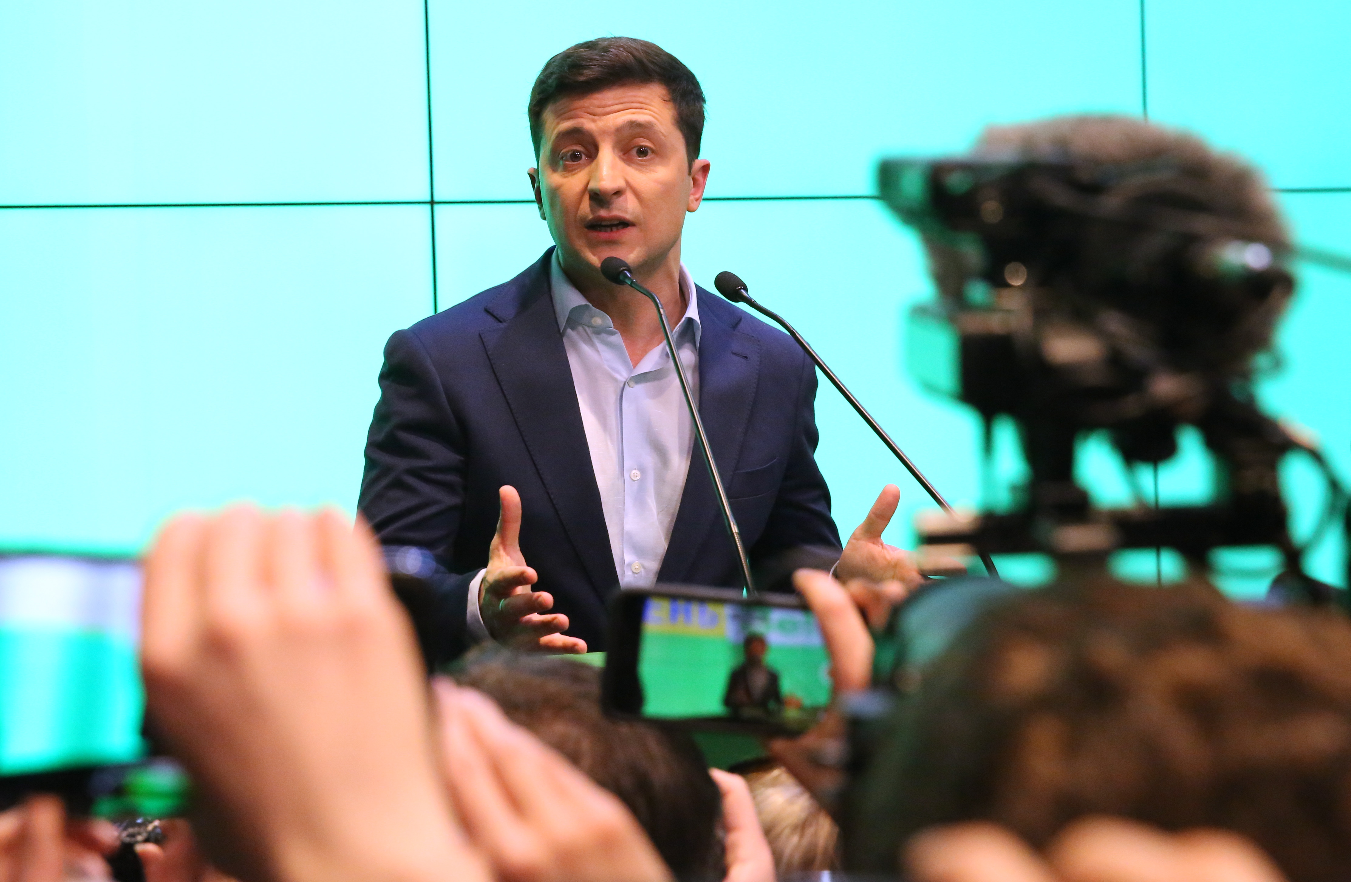 epa07520524 Ukrainian Presidential candidate Volodymyr Zelensky talks to media at the briefing after the announcement of exit-poll during the Ukrainian presidential elections in Kiev, Ukraine, 21 April 2019. Ukrainians voted during the second round of Presidential elections on 21 April 2019. Some 73.2 percent of voters supported presidential candidate Volodymyr Zelensky, while 25.3 percent voted for incumbent President Petro Poroshenko, according to results of the National Exit Poll 2019 project as of 18:00 Kiev time, an local media report.  EPA/TATYANA ZENKOVICH