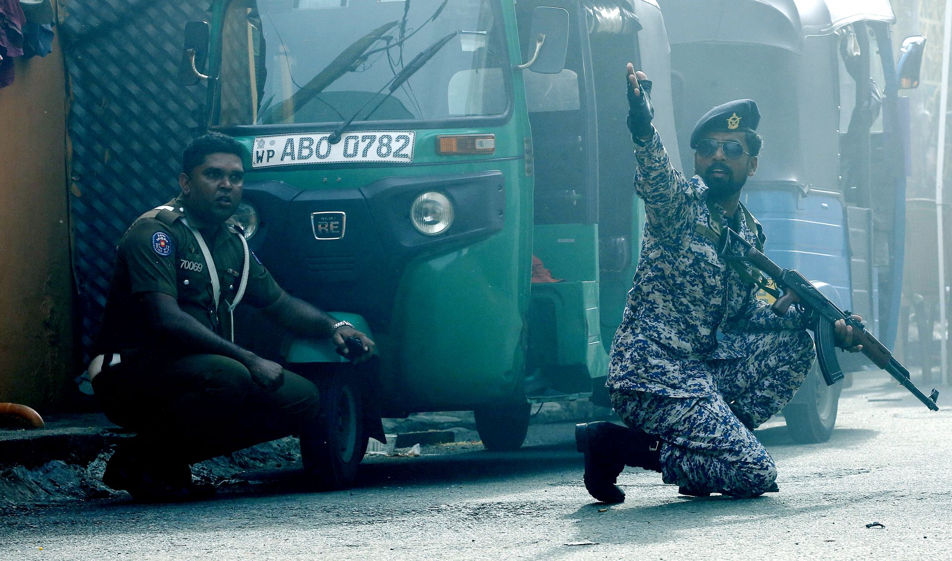 epa07521277 Security personal react as a device was detonated in a controled explosion in a van near the St Anthony's Church  Kochchikade in Colombo, Sri Lanka, 22 April 2019.  According to news reports, at least 290 people have been killed and over 500 were injured on 21 April 2019 in a series of blasts during Easter Sunday service at churches and hotels across Colombo.   EPA/M.A. PUSHPA KUMARA