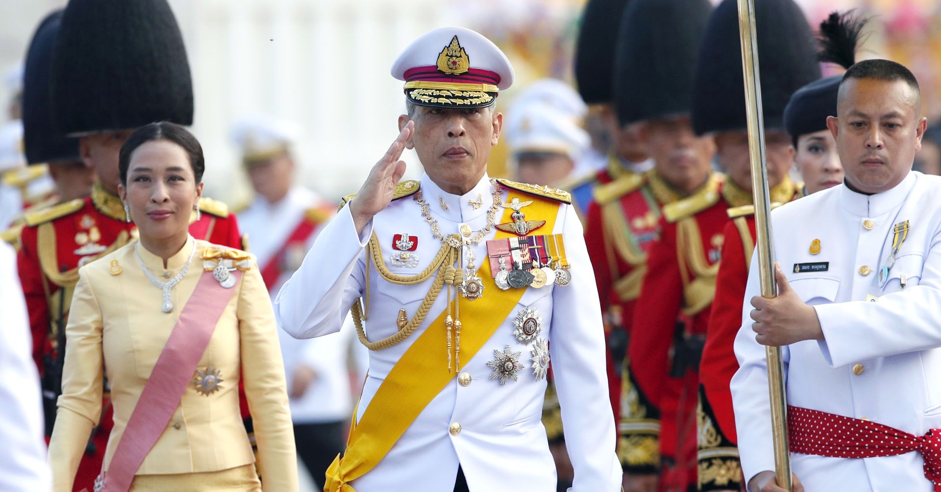 epa07488318 Thai King Maha Vajiralongkorn Bodindradebayavarangkun (C) salutes next to his daughter Princess Bajrakitiyabha (L) during a royal ceremony to mark Chakri Memorial Day at the King Rama I Monument in Bangkok, Thailand, 06 April 2019. Chakri Day falls annually on 06 April to commemorate the establishment of the Chakri Dynasty by King Rama I in 1782. The three-day ancient elaborate coronation ceremonies for Thai King Maha Vajiralongkorn also known as King Rama X will be held from 04 to 06 May 2019. The coronation is formally ceremony to complete the monarch's accession to the throne.  EPA/RUNGROJ YONGRIT