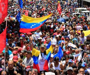 epa07539003 A handout photo made available by Miraflores press shows supporters of Venezuelan President Nicolas Maduro as they demonstrate against the president of the Parliament Juan Guaido, in Caracas, Venezuela, 30 April 2019. After some military personnel joined him, Venezuelan interim President Juan Guaido has asked supporters to take to the streets in order to end the regime of President Nicolas Maduro.  EPA/Mirfaflores Press HANDOUT  HANDOUT EDITORIAL USE ONLY/NO SALES