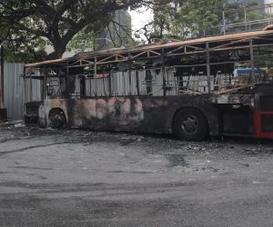 epa07540288 A fire gutted bus on a street in Caracas, Venezuela, 01 May 2019, a day after members of the opposition clashed with govedrnment forces. Reports state that the head of the Venezuelan Parliament Juan Guaido, called 'all Venezuela to the streets' today to continue with the called "Operacion Libertad" (freedom operation), hoping that the President Nicolas Maduro leave power.  EPA/Miguel Gutierrez