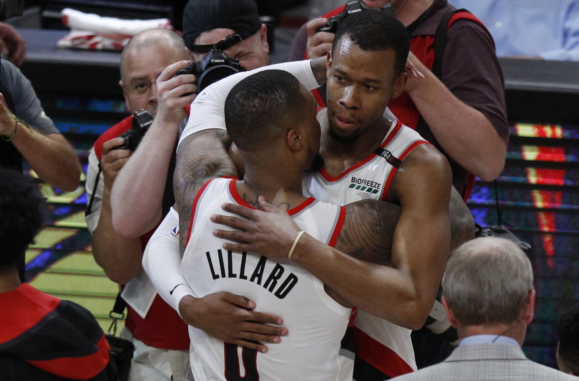 epa07546077 Portland Trail Blazers guard Damian Lillard (L) congratulates teammate Portland Trail Blazers guard Rodney Hood (R) after a four overtime Western Conference second round playoff game three between the Denver Nuggets and the Portland Trail Blazers at the Moda center in Portland, Oregon, USA, 03 May 2019.  EPA/STEVE DIPAOLA  SHUTTERSTOCK OUT