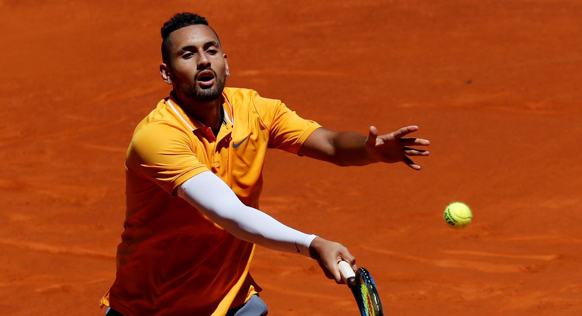 epa07548596 Australian player Nick Kyrgios in action during his first round match against German Jan-Lennard Struff at the Mutua Madrid Open tennis tournament, in Madrid, Spain, 05 May 2019.  EPA/CHEMA MOYA
