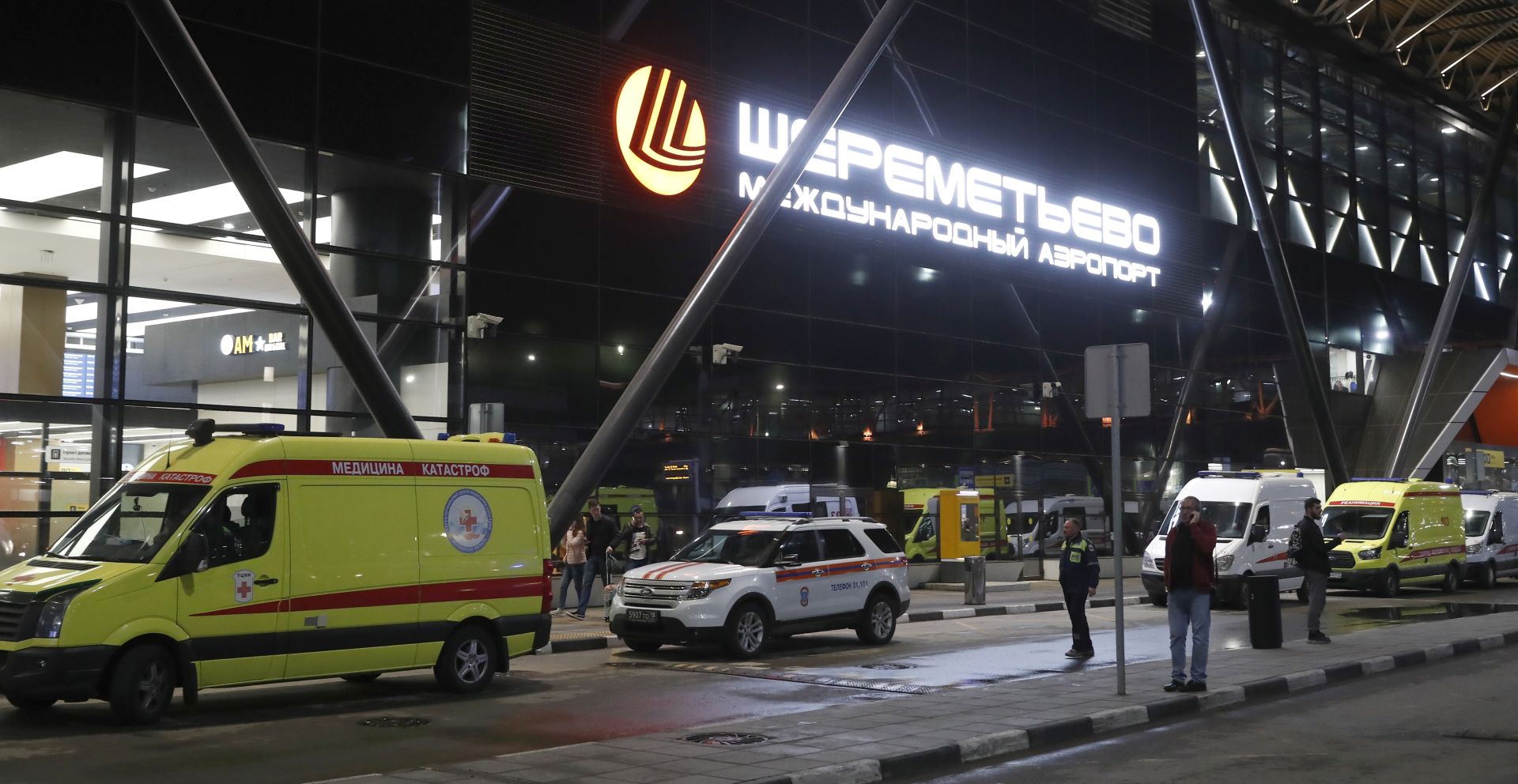 epa07549815 An ambulance vehicle stands in front of Aeroflot's Sheremetyevo airport terminal, after the fire which emerged while the Sukhoi Superjet 100 of Russian airline Aeroflot plane crashlanded was put out at Moscow's Sheremetyevo airport, Russia, 05 May 2019. According to authorities, at least 13 people died after the plane had to make an emergency landing just after take off for the flight to Murmansk.  EPA/SERGEI ILNITSKY