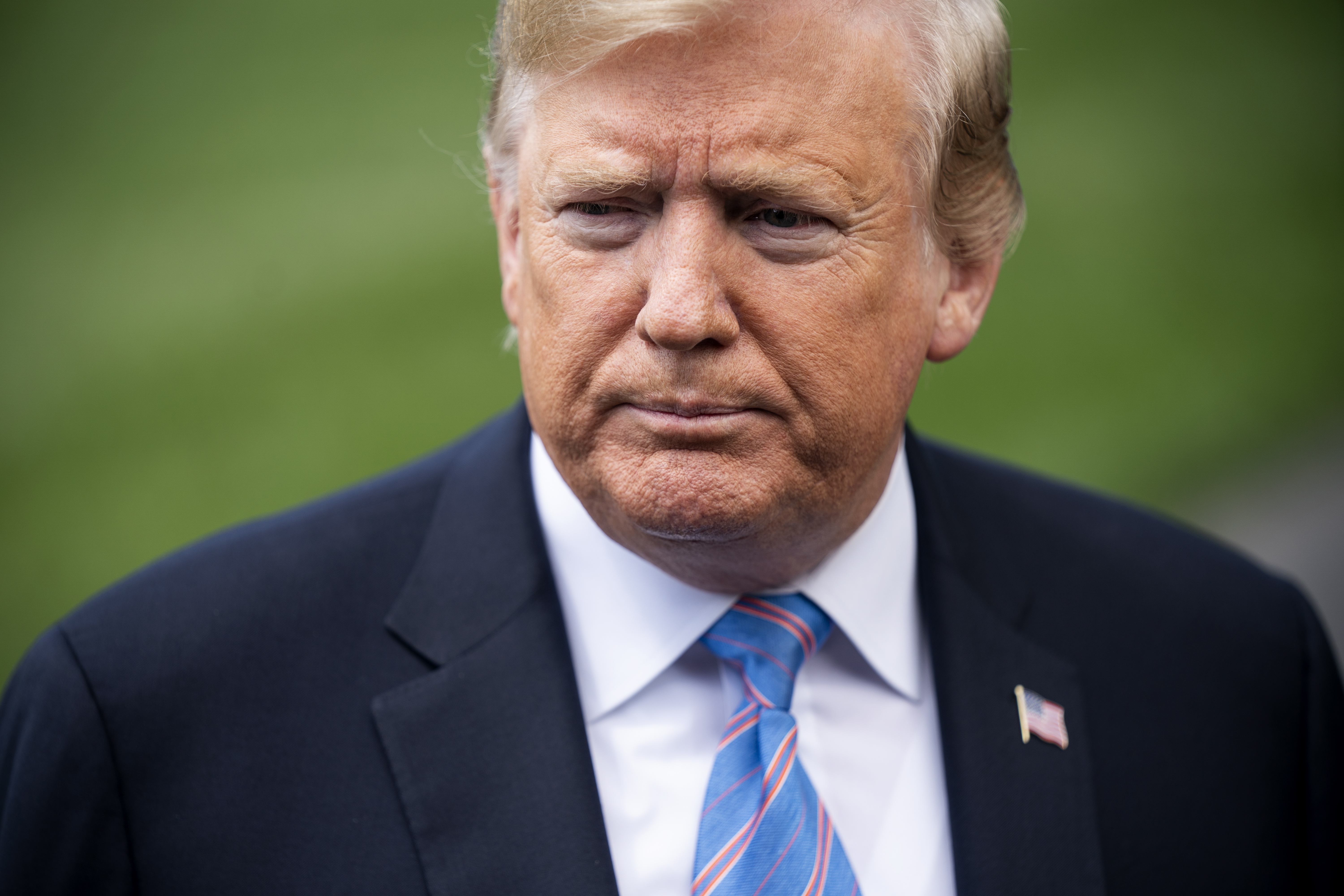 epa07570176 US President Donald J. Trump speaks to the media about China tariffs and the tensions with Iran, as he departs the White House for events in Louisiana, in Washington, DC, USA, 14 May 2019. Electronics imported from China, such as laptops and cellphones, could face tariffs as high as 25 percent should the President authorize another round of tariff hikes.  EPA/JIM LO SCALZO