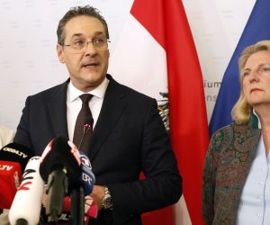 epa07580344 Austria's Vice-Chancellor Heinz Christian Strache (C) of the Austrian Freedom Party (FPOe) gives a statement to the journalists as Labour Minister Beate Hartinger-Klein (L) and Foreign Minister Karin Kneissl (R) listen in the Ministry of Public Service and Sport in Vienna, Austria, 18 May 2019. Austrian Vice Chancellor Strache on 18 May 2019 said he will step down from his post as media caught the far-right FPOe's leader Strache in a corruption allegations scandal. German media have on 17 May 2019 published a secretly recorded video of Strache in Ibiza in July 2017, where Heinz-Christian Strache is claimed to meet an alleged niece of a unknown Russian oligarch who wanted to invest large sums of money in Austria.  EPA/FLORIAN WIESER