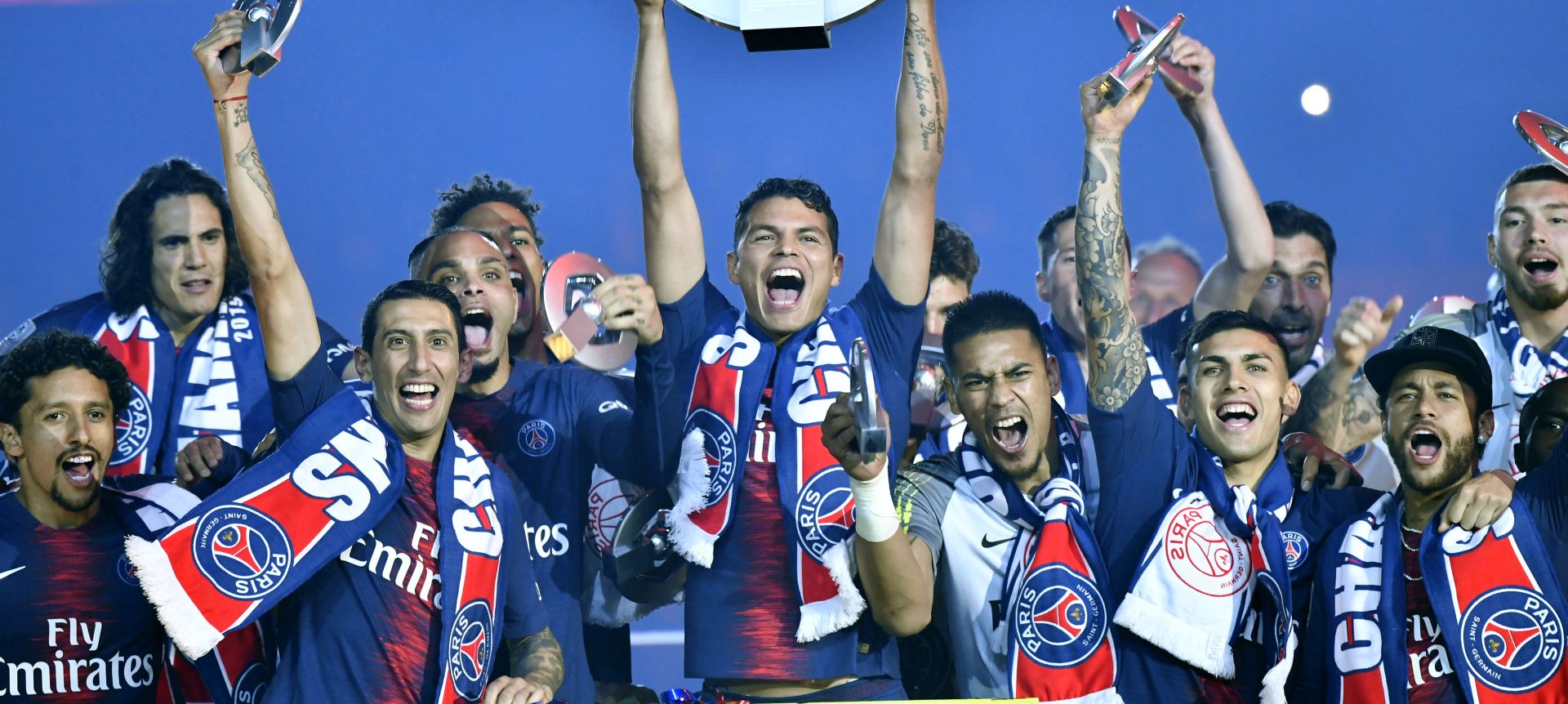 epa07582925 Paris Saint Germain players celebrate with the league winner trophy during a ceremony after the French Ligue 1 soccer match between Paris Saint-Germain (PSG) and Dijon FCO at the Parc des Princes stadium in Paris, France, 18 May 2019.  EPA/Julien de Rosa