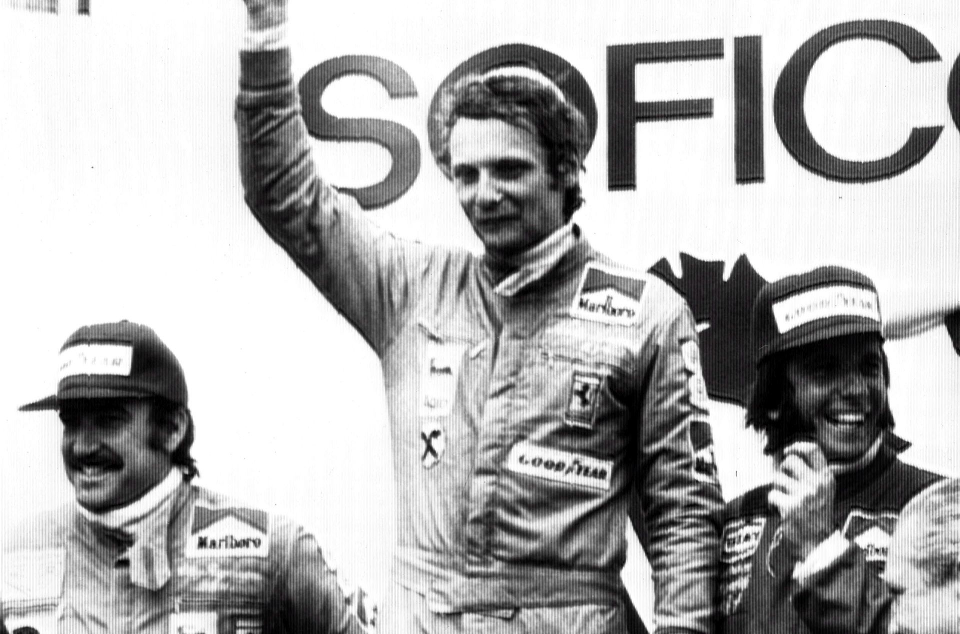 epa07588244 (FILE) - A black and white file photo dated 28 April 1974 shows Swiss former Formula One champion Clay Regazzoni (L) with Niki Lauda (C) and Emerson Fittipaldi on winners' podium of the Grand Prix of Spain (reissued 21 May 2019). According to media reports on 21 May 2019, Austrian Formula 1 legend Niki Lauda died on 20 May 2019 at the age of 70. Lauda won the Formula 1 championship in 1975, 1977 and 1984, and founded three airlines. Former Ferrari pilot Regazzoni died in a car accident near Parma, Italy, 15 December 2006.  EPA/STF