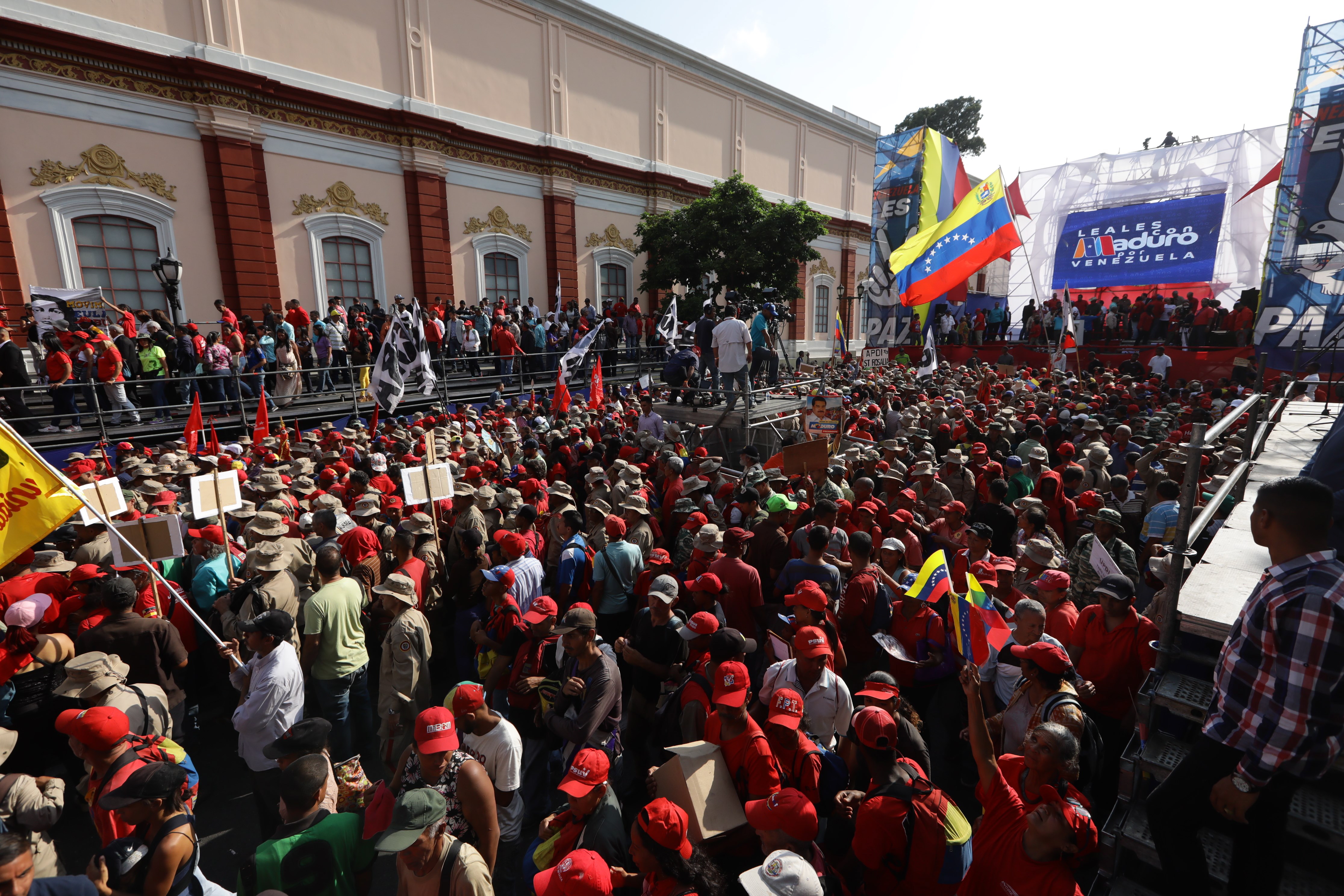 epa07587944 Hundreds of Government supporters attend an act of government headed by the President of Venezuela Nicolas Maduro to celebrate the first anniversary of the elections in Venezuela, of which Maduro proclaimed himself the winner, and that have not been recognized by the international community due to alleged irregularities, in Caracas, Venezuela, 20 May 2019.  EPA/Rayner Pena