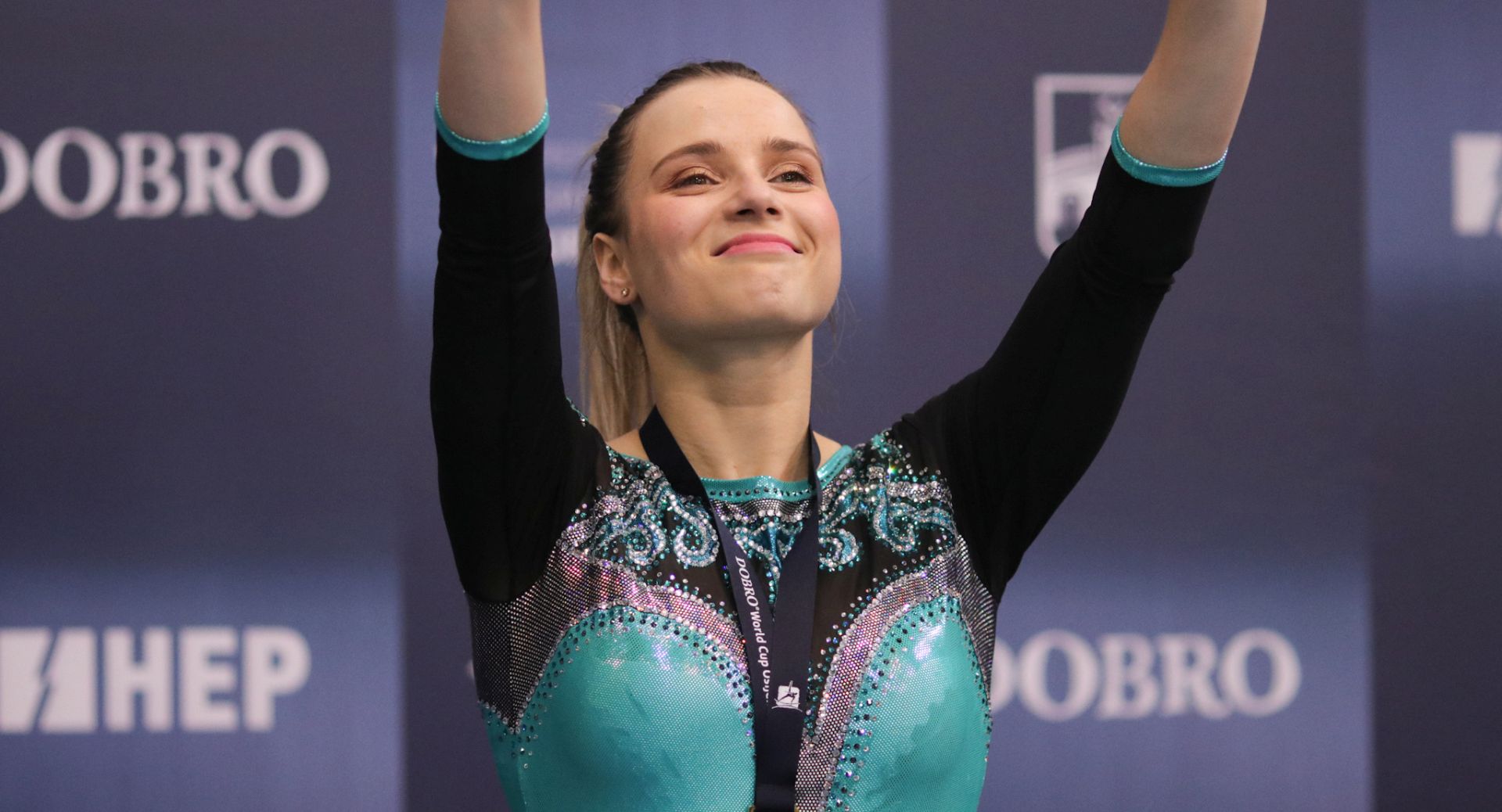 Osijek, 26.5.2019 - Najbolja hrvatska gimnastièarka Ana Ðerek osvojila je zlatnu medalju na  natjecanju Svjetskog kupa koje je u nedjelju zavreno u Osijeku, nakon to je briljantno izvela svoju vjebu na tlu, dok je najbolji hrvatski gimnastièar Tin Srbiæ zbog pada zavrio kao esti na preèi. Na slici Ana Ðerek.
foto HINA/ Gimnastièko drutvo Osijek - ito/ Marko Baniæ/ ua