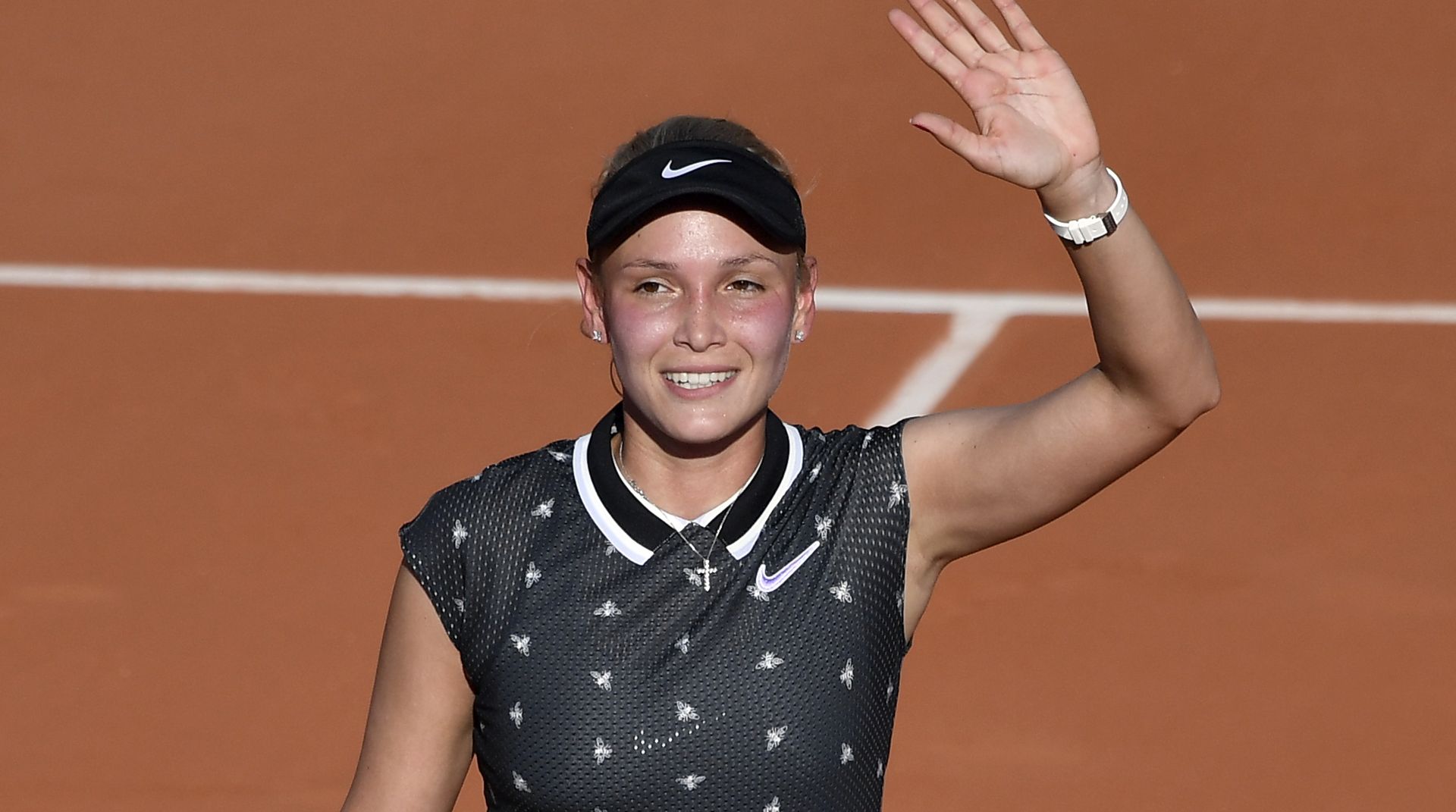 epa07615737 Donna Vekic of Croatia reacts after winning against  Belinda Bencic of Switzerland their women’s third round match during the French Open tennis tournament at Roland Garros in Paris, France, 31 May 2019.  EPA/JULIEN DE ROSA