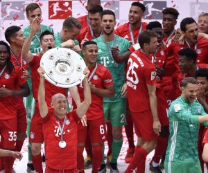 epa07581595 Munich team celebrate with the trophy after winning the German championship after the German Bundesliga soccer match between FC Bayern Munich and Eintracht Frankfurt in Munich, Germany, 18 May 2019.  EPA/LUKAS BARTH-TUTTAS CONDITIONS - ATTENTION: The DFL regulations prohibit any use of photographs as image sequences and/or quasi-video.