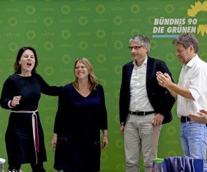 epa07605216 German top candidate of The Greens party for the European Parliament elections, Sven Giegold (2-R) and the Greens candidate for Bremen, Maine Schaefer (2-L) are congratulated by co-chairwoman Annalena Baerbock (L) and co-chairman Robert Habeck (R) as board members celebrate the European election results during a weekly meeting at the party headquarters in Berlin, Germany, 27 May 2019. The Greens experienced a raise up to 20 percent of the votes in the European elections in Germany. The European Parliament election was held by member countries of the European Union (EU) from 23 to 26 May 2019.  EPA/FELIPE TRUEBA