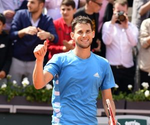 epa07630454 Dominic Thiem of Austria reacts after winning against Karen Khachanov of Russia their men’s quarter final match during the French Open tennis tournament at Roland Garros in Paris, France, 06 June 2019.  EPA/CAROLINE BLUMBERG