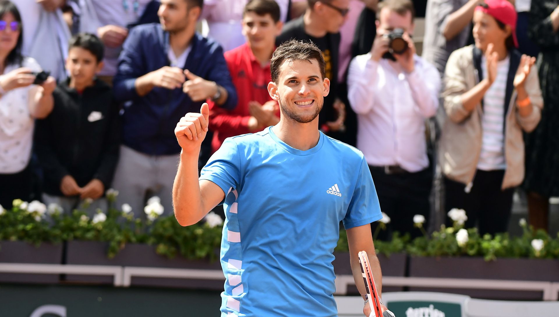 epa07630454 Dominic Thiem of Austria reacts after winning against Karen Khachanov of Russia their men’s quarter final match during the French Open tennis tournament at Roland Garros in Paris, France, 06 June 2019.  EPA/CAROLINE BLUMBERG