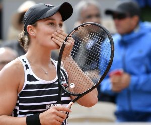 epa07635243 Ashleigh Barty of Australia reacts after winning the women’s final match against Marketa Vondrousova of the Czech Republic during the French Open tennis tournament at Roland Garros in Paris, France, 08 June 2019.  EPA/JULIEN DE ROSA