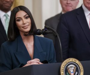 epa07646641 Reality star turned activist Kim Kardashian West (L) joined US President Donald J. Trump (R) on stage to deliver remarks during an event on second chance hiring programs for felons following incarceration in the East Room of the White House in Washington, DC, USA, 13 June 2019. The administration announced it is working with the private sector and non-profit organizations to help give former prisoners a second chance at the American dream.  EPA/SHAWN THEW